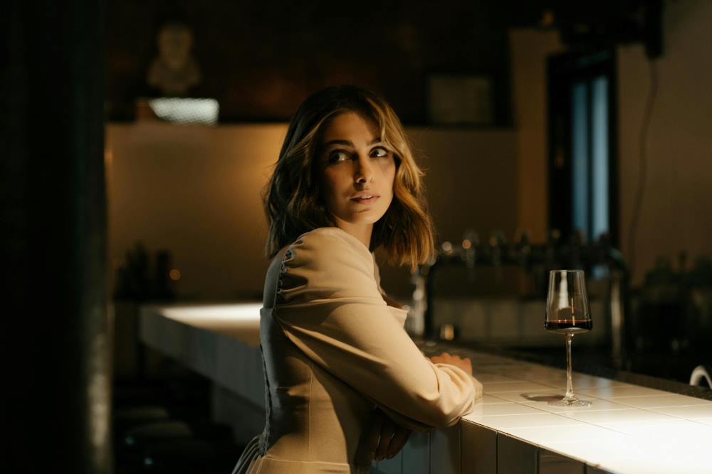 Woman waiting at a bar